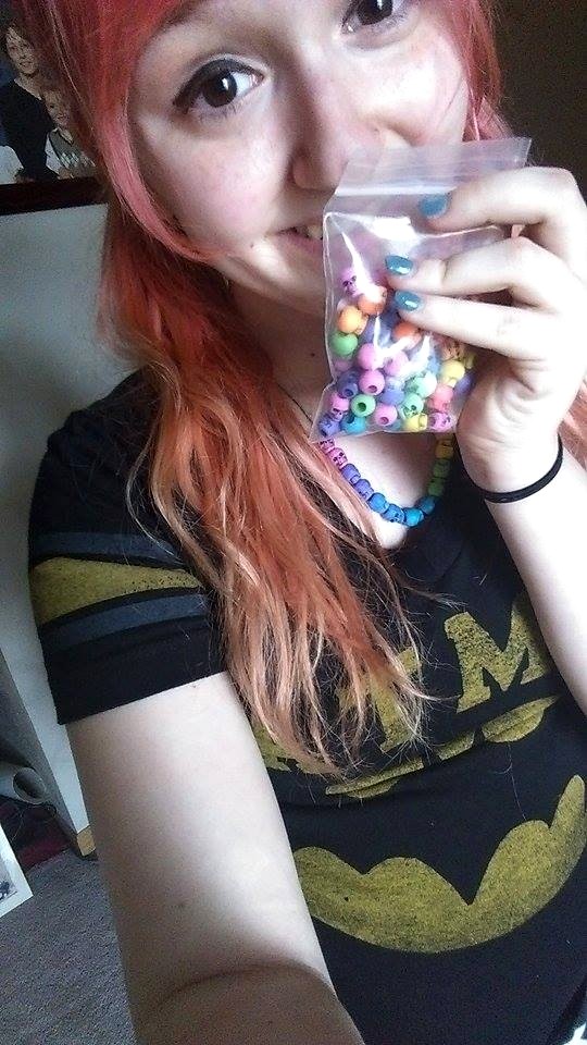 cute redhead with skull beads