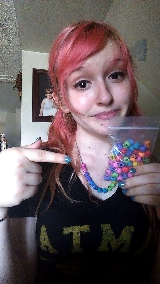 cute girl with skull beads
