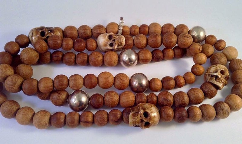 bone skull beads, teakwood and sterling silver necklace