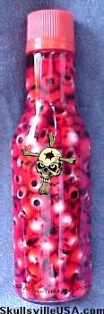 skull beads in a bottle